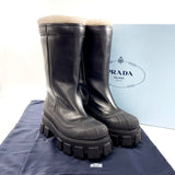 PRADA プラダ モノリス シアリングブーツ 1W380M ブーツ
 レザー/ムートン ブラック【中古】
 レディース